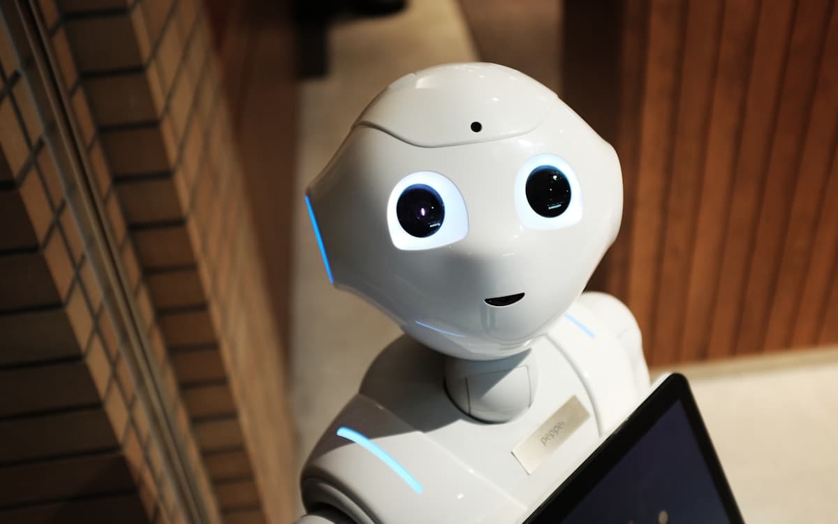 A white AI assistant robot, representing Anthropic's Claude.ai chat assistant.