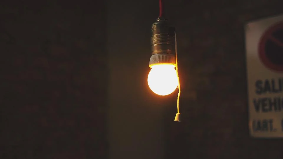 Bare bulb hanging from a ceiling cord, the simplest fitting for smart lighting for renters