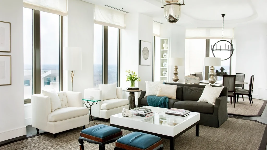 Bright apartment living room with windows and seating