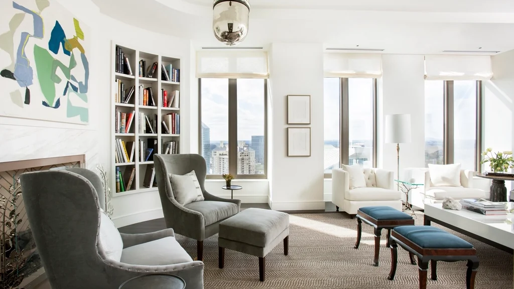 Bright living area with seating and large windows