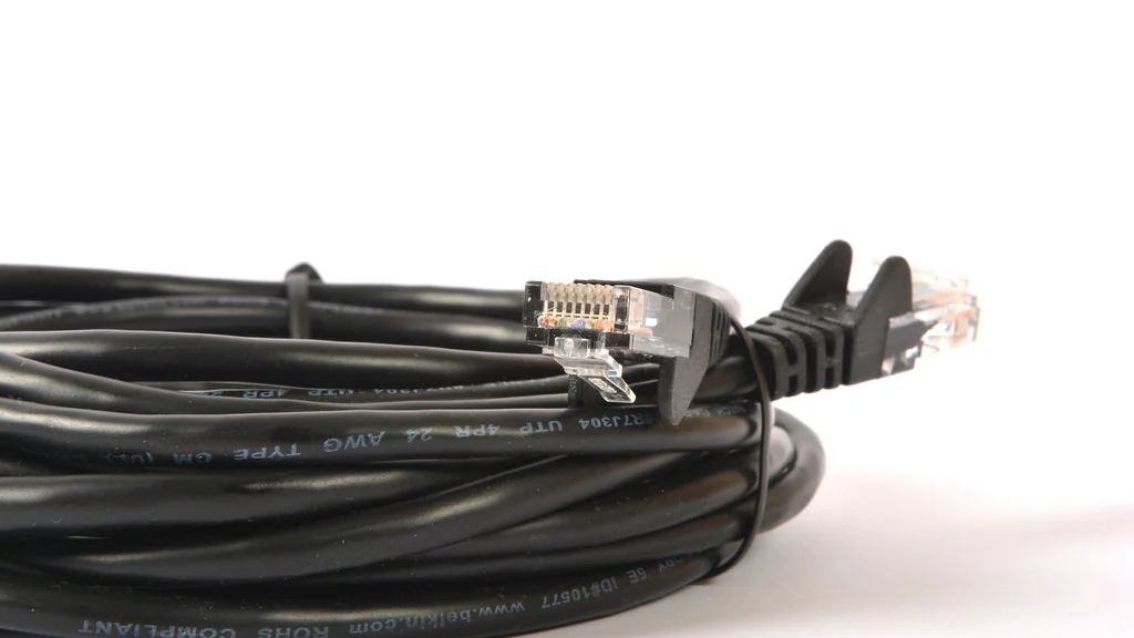 Coiled black power and network cables