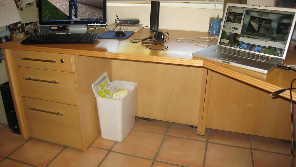 Home office desk with a monitor and computer equipment