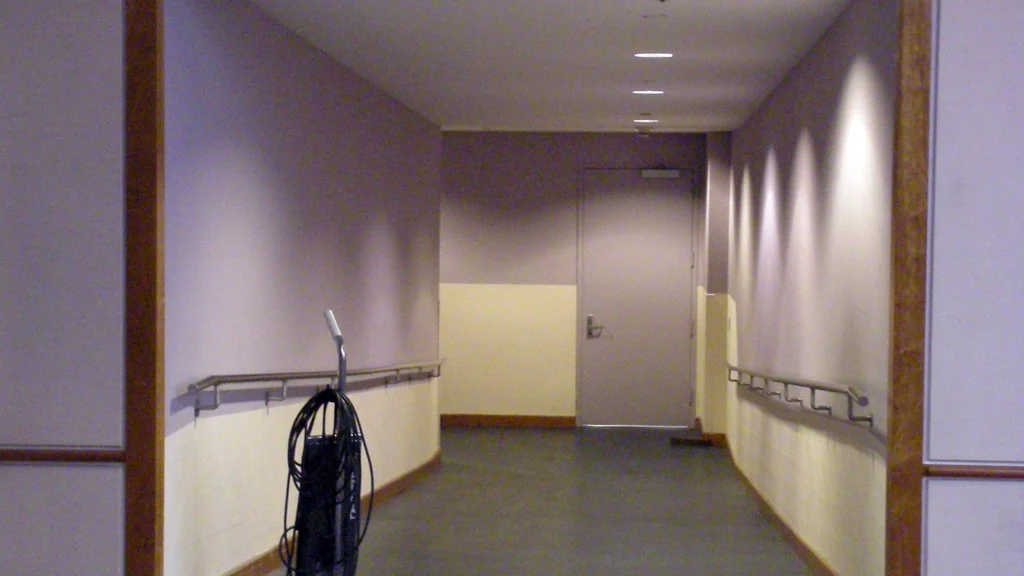 Lit hallway inside a home, the route that night lighting should cover
