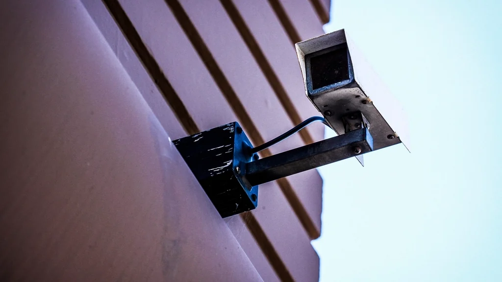 Security camera mounted on the corner of a building