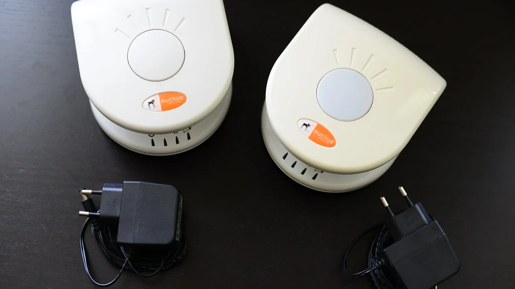 Smart Device Not Connecting to WiFi? 9 Easy Fixes Two home Wi-Fi routers with power adapters, the first thing to check when a smart device is not connecting to wifi
